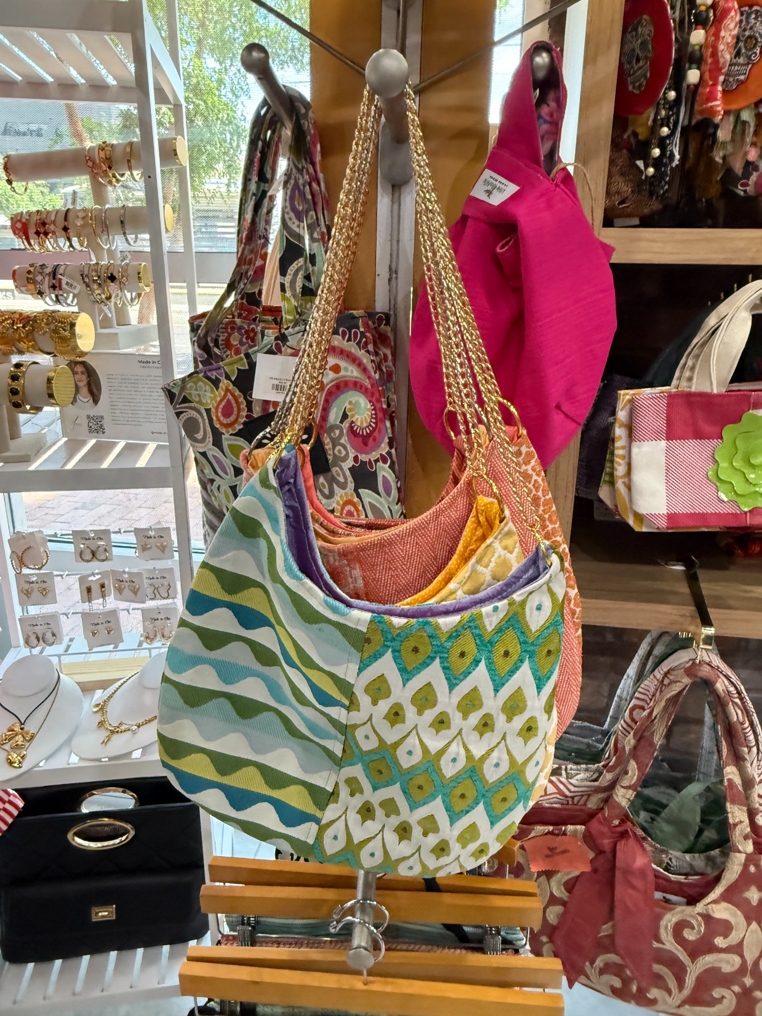 Vive Bonito handbags merchandised in an independent retail shop